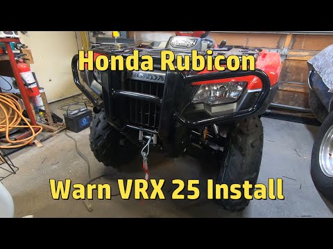 Видео: Установка лебедки Honda Rubicon 520 и Warn VRX