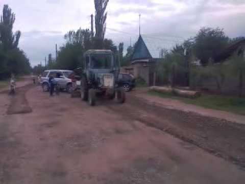 Видео: Восточная улица н.чуйск. трактор т25 гредер