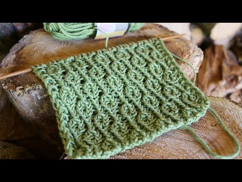 Видео: Красивый узор на основе резинки спицами
