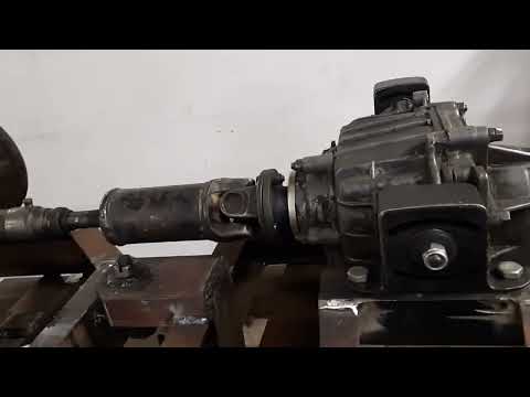 Видео: установка мостов, раздаточной коробки и изготовление кардана для минипогрузчика на гидроходу.