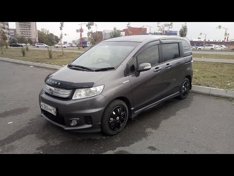 Видео: Краткий обзор а/м Honda Freed Spike Hybrid 2013 г/в