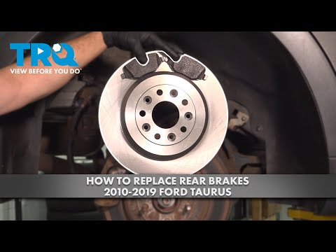 Видео: Как заменить задние тормоза Ford Taurus 2010-2019