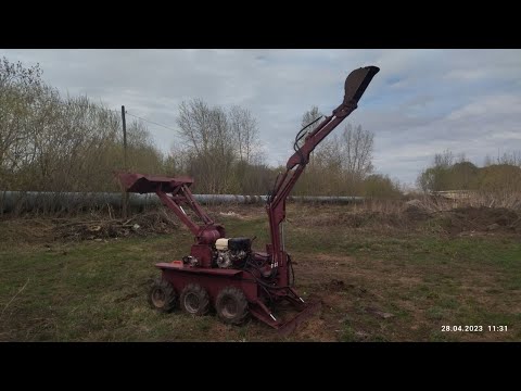 Видео: Экскаватор-погрузчик на шасси ТС-350. Завершение проекта