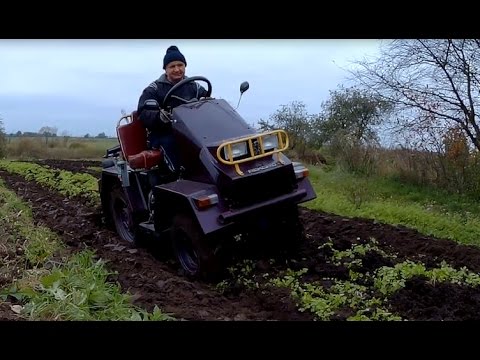 Видео: Стильный минитрактор из мотоблока МТЗ: пашем землю на зиму