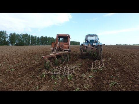 Видео: Дополненное видео о основных моментах навески плугов на тактора ДТ 75 ,МТЗ 82.