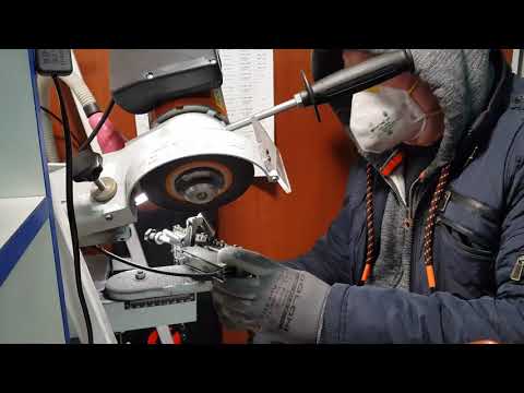 Видео: Заточка пильных цепей,профессиональным станком STIHL USG