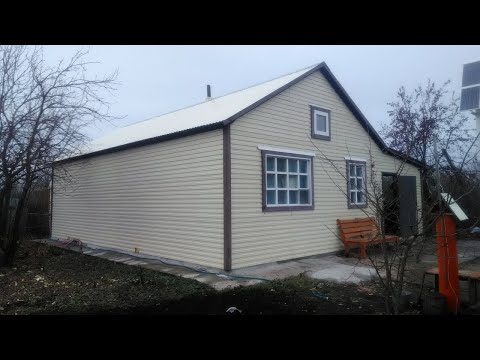 Видео: Ультра-бюджетный каркасный домик, и отопление кирпичной печкой