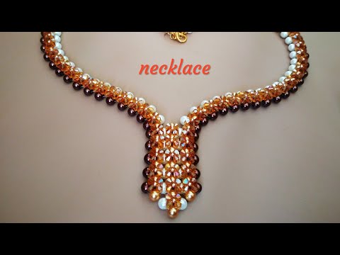 Видео: Necklace. Колье из бусин и биконусов. Мастер-класс