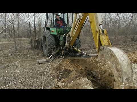 Видео: Экскаватор ЮМЗ. Только работа. Ковш 35см. Или на что способен ЭО 2621 в стоке.