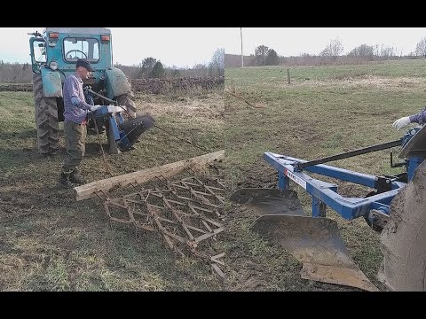 Видео: Распашка участка под засев подсолнечника трактором Т-40 с плугом ,,Гранит , Палехагромашь НПЛ 2-35 .