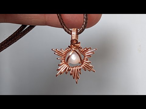 Видео: Мастер-класс по изготовлению подвески-кабошона в форме звезды, солнца или снежинки из проволоки