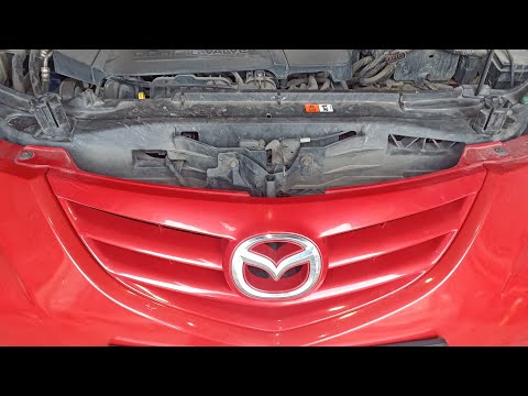Видео: Мазда 3. Замена радиатора кондиционера.