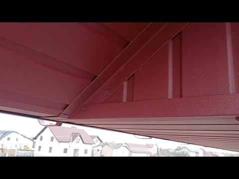 Видео: Подшивка крыши металлопрофилем. Монтаж водосточной системы