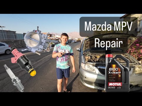 Видео: mazda mpv заміна форсунок,свічок,мастила.зняття впускного колектора