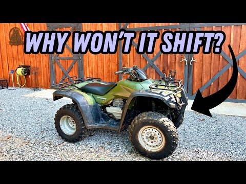 Видео: Почему не переключается передача на Honda Rancher 2005 года?