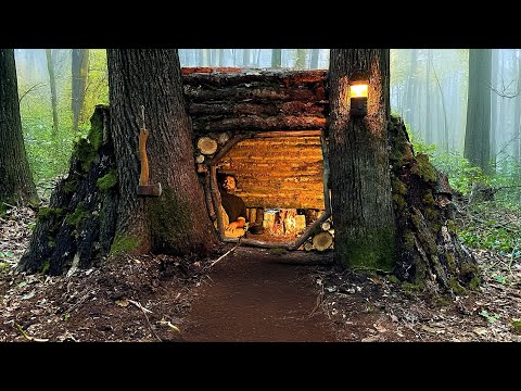 Видео: Bushcraft SURVIVAL Shelter; Строительство теплой естественной землянки. Кемпинг в домике на дереве