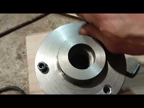 Видео: Проточка планшайбы и "посадка" патрона на ТВ 4.