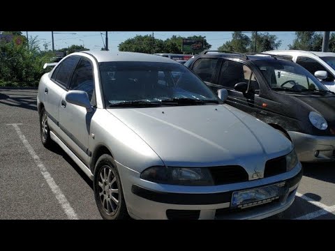 Видео: Замена ремня ГРМ и сальник КВ и РВ на Mitsubishi Carisma 4 G15.