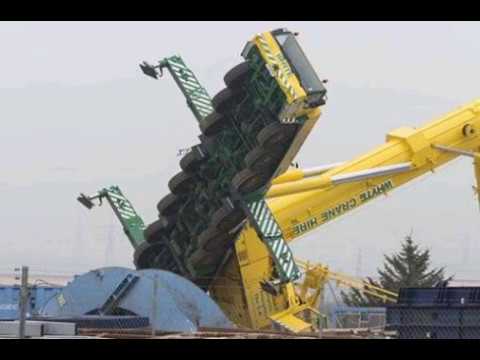 Видео: Падение кранов