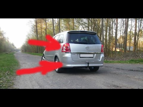 Видео: Opel Zafira. Снимаем фару, лючек, бампер.