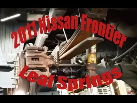 Видео: Замена задней листовой рессоры Nissan Frontier 2011 года