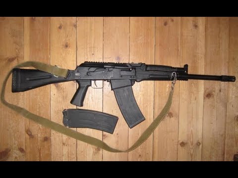 Видео: Сайга 12к 030 Обзор и Стрельба