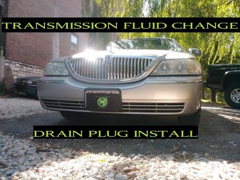 Видео: Как заменить трансмиссионную жидкость Lincoln Town Car