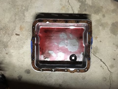 Видео: Как заменить прокладку и жидкость в поддоне коробки передач