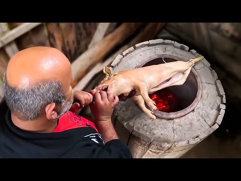 Видео: Молочный поросенок на вертеле по-грузински: секрет вкусного и сочного мяса