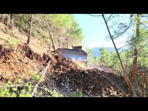 Видео: РАЙОН, ГДЕ БУЛЬДОЗЕР ЗАСТРЯЛ ВО ВРЕМЯ СТРОИТЕЛЬСТВА ЛЕСНОЙ ДОРОГИ