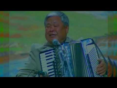 Видео: Токон Эшбаев "Гүл болсоң сан гүлдөрдүн арасынан"