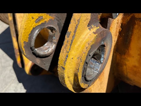 Видео: Ковш погрузчика для бурения (плохой…)