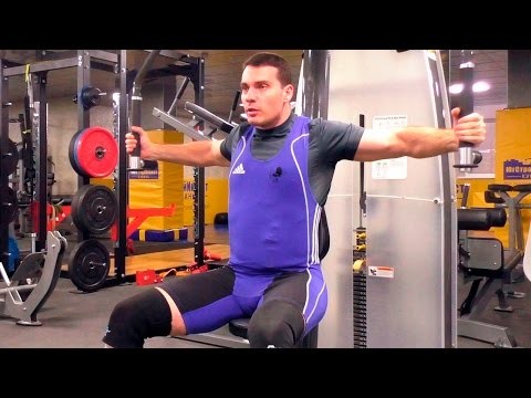 Видео: Сведение рук в тренажёре Бабочка: техника и нюансы