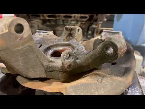 Видео: Замена переднего ступичного подшипника Ford Edge 2007–2014 годов выпуска