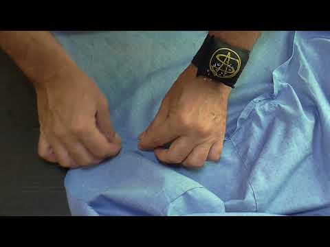 Видео: Мужская сорочка. Втачивание рукава в открытую пройму запошивочным швом.