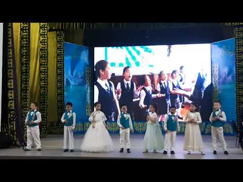 Видео: Есеп беру концерті - «Бақытты балалық шақ» әні