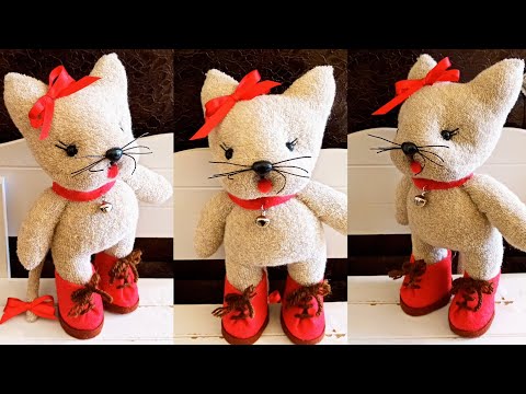 Видео: МИЛАЯ ИГРУШЕЧНАЯ КОШКА В НОСКАХ-КОШКА В ОДНИХ НОСКАХ