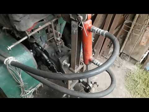 Видео: Нове кріплення гідроциліндра на мінітракторі