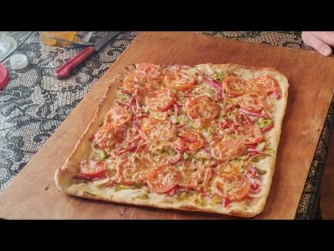 Видео: Приготовление пиццы в русской печи