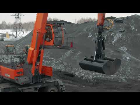 Видео: Работа нашего двухчелюстного грейфера на перегружателе UMG E350WH на Кедровском угольном разрезе