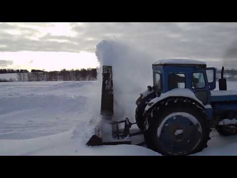 Видео: Испытание самодельного шнекороторного снегоуборщика.