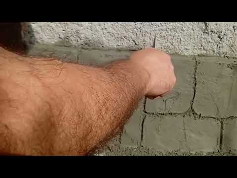 Видео: Отделка цоколя из артбетона, полный процесс.