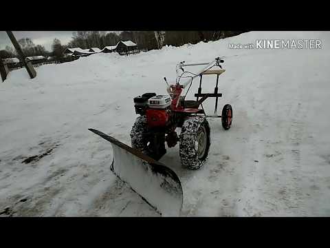 Видео: Уборка снега мотоблоком.