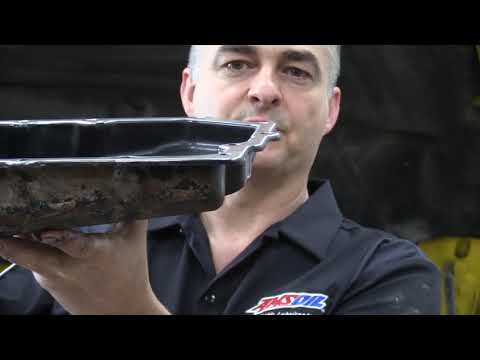 Видео: Промывка трансмиссии Dodge Dakota 2007 года