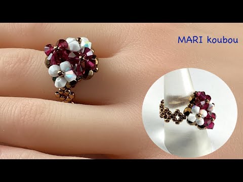 Видео: Кольцо с 4 маленькими цветочками