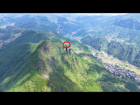 Видео: «На одинокой вершине в горах Гуйчжоу стоит дом. Он слишком опасен!