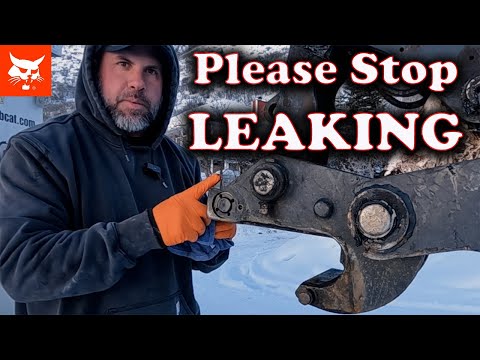 Видео: Утечка в гидравлической системе X-Change экскаватора Bobcat