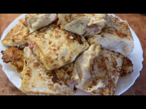 Видео: Рулетики из лаваша с сыром и колбасой | Рецепт быстрого, вкусного и сытного блюда 