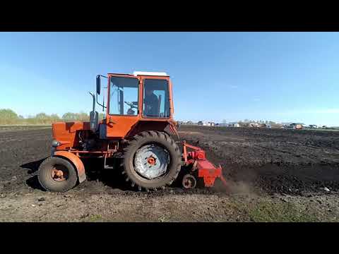 Видео: Фрезерование с помощью почвофрезы 1 GQN-160.Трактор т-25.