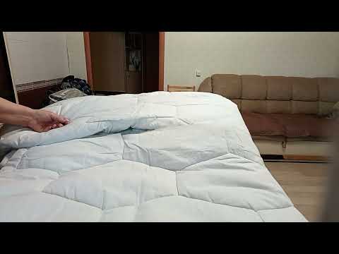 Видео: Распаковка стеганного полотна от Магнатекс.